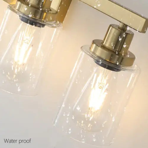 Gold 4 Lamp Vanity Light With Clear Glass Shade